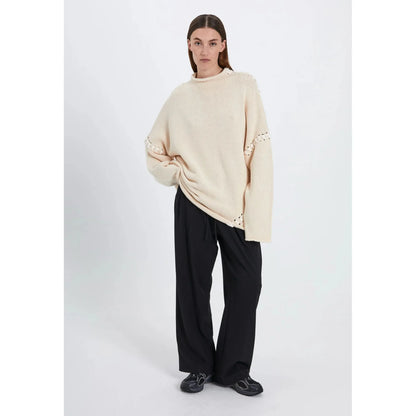 Strings knit top