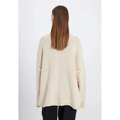 Strings knit top